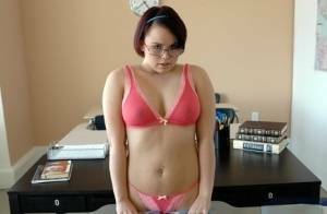 Enchanting coed in glasses Kaci Starr revealing puffy butt and tits on picsfans.net