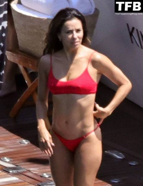 Eva Longoria Showcases Her Stunning Figure and Ass Crack in a Red Bikini on Holiday in Capri on picsfans.net